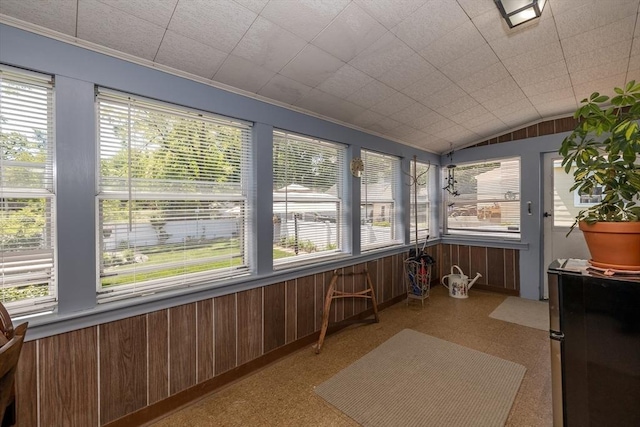 21 Alfred St, Woburn, MA 01801 - sunroom featuring plenty of natural light, wooden walls, ornamental molding, and lofted ceiling