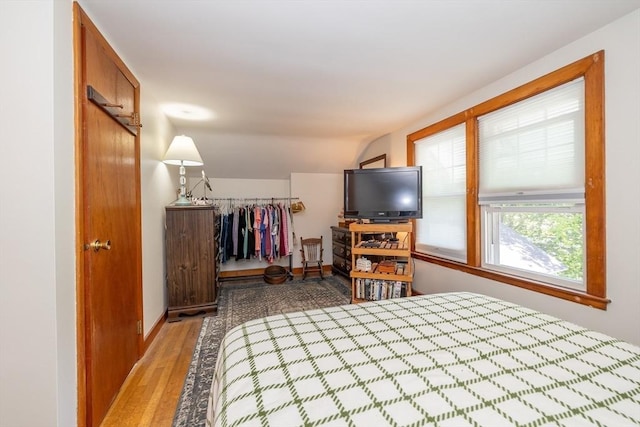 21 Alfred St, Woburn, MA 01801 - bedroom with light wood-style floors and vaulted ceiling