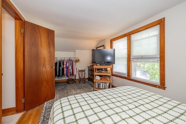 21 Alfred St, Woburn, MA 01801 - bedroom with vaulted ceiling and wood finished floors