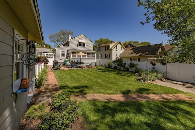 21 Alfred St, Woburn, MA 01801 - rear view of house with an outdoor hangout area and a patio area