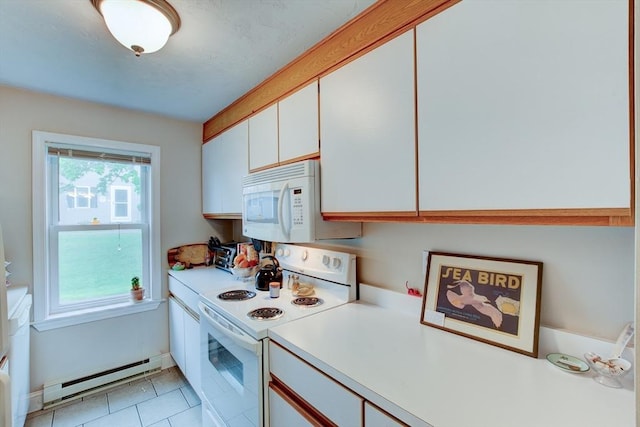 112 Olde Colonial Dr Unit 3, Gardner, MA 01440 - kitchen with white appliances, a baseboard heating unit, light countertops, and white cabinetry
