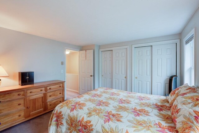 112 Olde Colonial Dr Unit 3, Gardner, MA 01440 - bedroom with dark colored carpet and two closets