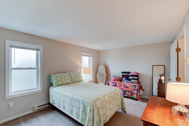 112 Olde Colonial Dr Unit 3, Gardner, MA 01440 - carpeted bedroom with a baseboard heating unit and baseboards