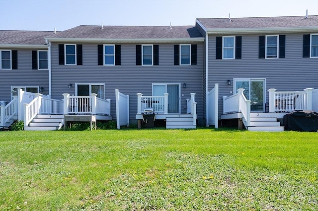 112 Olde Colonial Dr Unit 3, Gardner, MA 01440 - back of property featuring a deck and a lawn