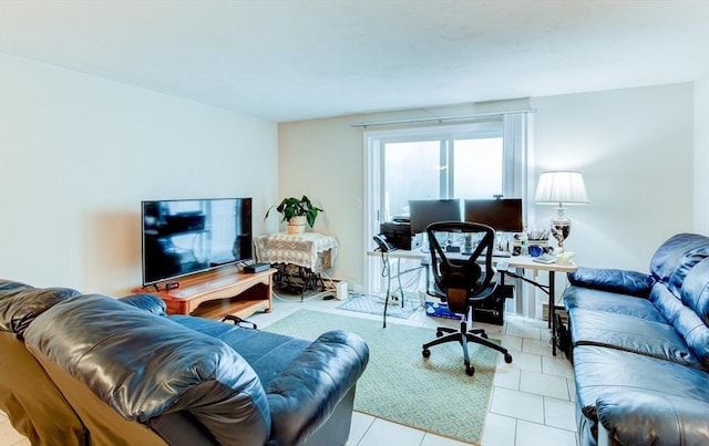 112 Olde Colonial Dr Unit 3, Gardner, MA 01440 - living room with a desk and tile patterned floors