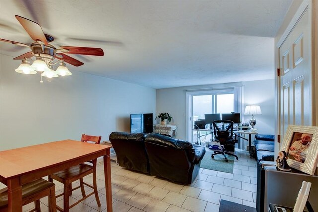 112 Olde Colonial Dr Unit 3, Gardner, MA 01440 - living room featuring ceiling fan, a desk, and light tile patterned floors