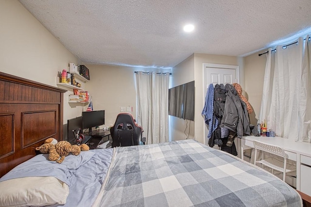 bedroom with a textured ceiling