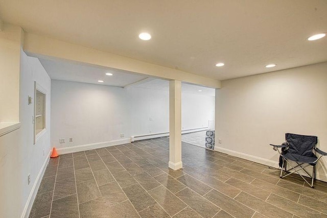 basement with a baseboard heating unit