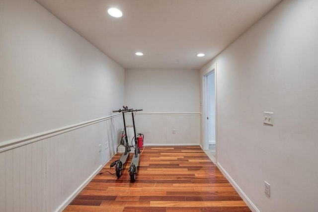 exercise area featuring light hardwood / wood-style flooring