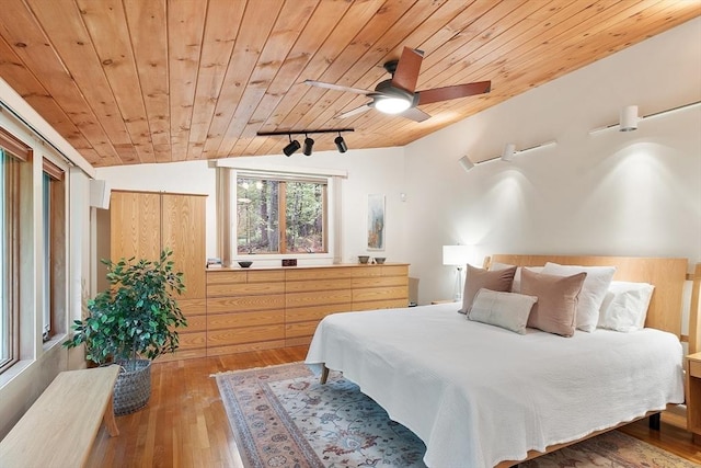 77 Temple Rd, Concord, MA 01742 - bedroom with wood ceiling, hardwood / wood-style floors, lofted ceiling, ceiling fan, and rail lighting