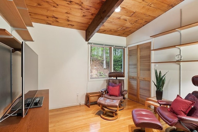 77 Temple Rd, Concord, MA 01742 - living area with wooden ceiling, wood finished floors, and baseboards
