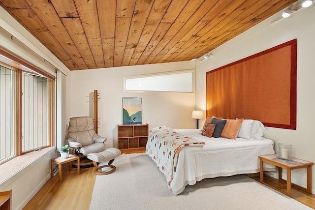 77 Temple Rd, Concord, MA 01742 - bedroom featuring wood ceiling, wood finished floors, and multiple windows