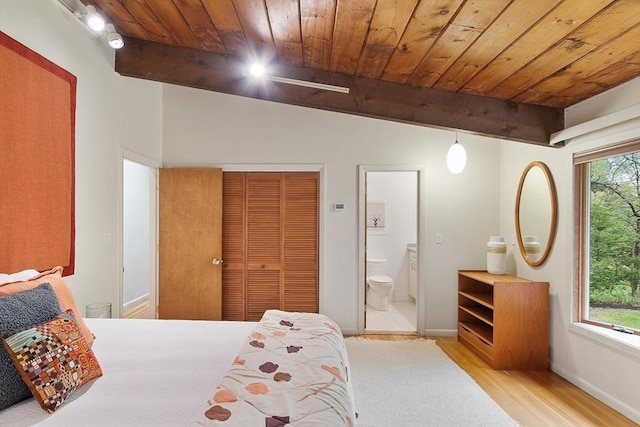 77 Temple Rd, Concord, MA 01742 - bedroom with wood ceiling, light wood-style floors, ensuite bathroom, a closet, and baseboards