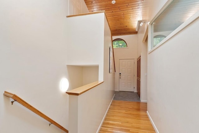 77 Temple Rd, Concord, MA 01742 - hallway with wood ceiling, an upstairs landing, wood finished floors, baseboards, and a high ceiling