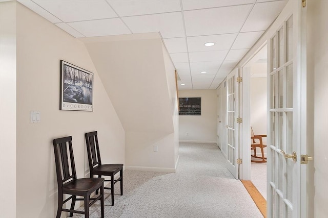 77 Temple Rd, Concord, MA 01742 - hall featuring french doors, a paneled ceiling, carpet, baseboards, and recessed lighting