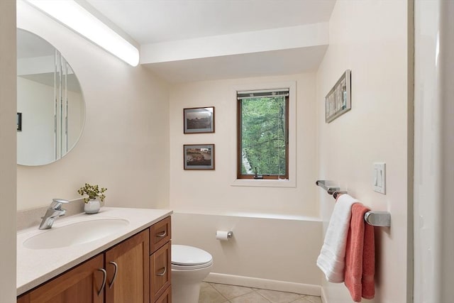 77 Temple Rd, Concord, MA 01742 - bathroom with tile patterned floors, toilet, vanity, and baseboards