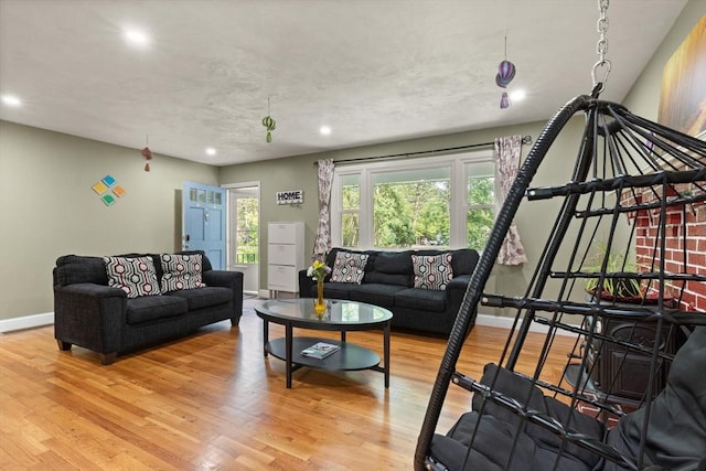 19 Shaker Ln, Littleton, MA 01460 - living room featuring light wood finished floors and recessed lighting