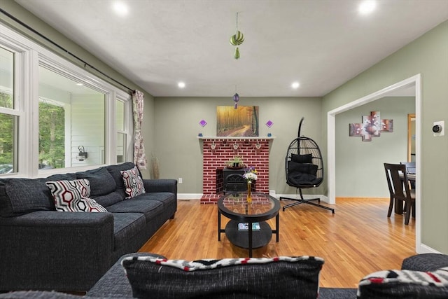 19 Shaker Ln, Littleton, MA 01460 - living room with wood finished floors, recessed lighting, and a fireplace