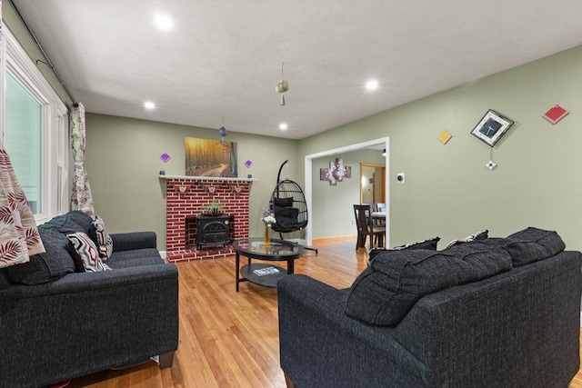 19 Shaker Ln, Littleton, MA 01460 - living area featuring light wood-style flooring, recessed lighting, and a wood stove