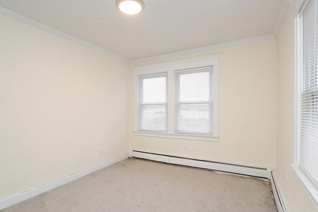 carpeted spare room featuring ornamental molding and a baseboard heating unit