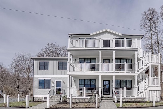 138 Flash Rd Unit 1, Nahant, MA 01908 - townhome / multi-family property featuring a balcony, stairs, and a porch