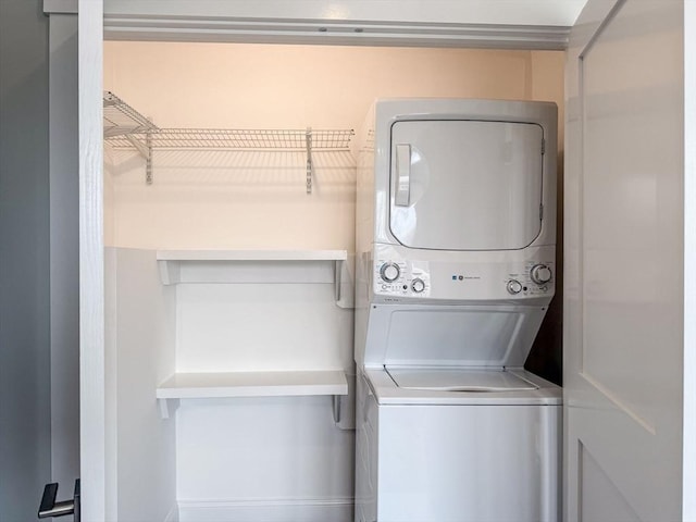 138 Flash Rd Unit 1, Nahant, MA 01908 - laundry area featuring stacked washing machine and dryer