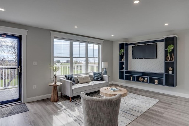 138 Flash Rd Unit 1, Nahant, MA 01908 - living room with healthy amount of natural light, wood finished floors, and recessed lighting