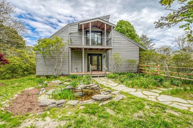 212 Charles Neck Way, West Tisbury, MA 02575 - rear view of house with a balcony