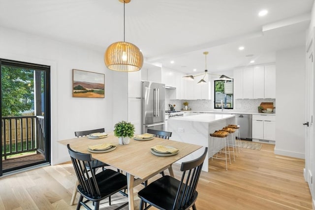 dining area featuring light hardwood / wood-style floors