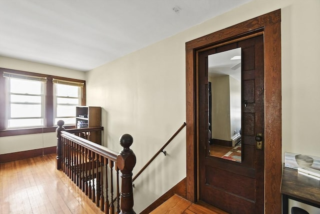 28 Upton St, Adams, MA 01220 - stairs featuring hardwood / wood-style flooring and baseboards