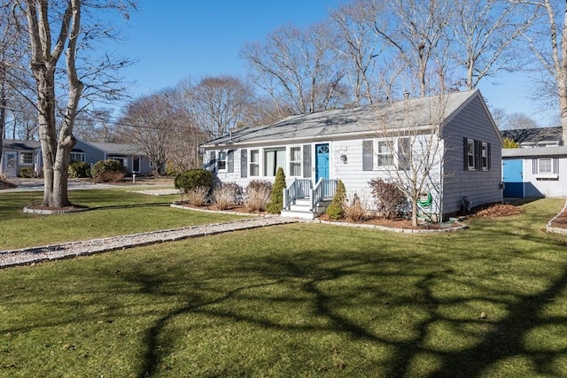 ranch-style house with a front lawn