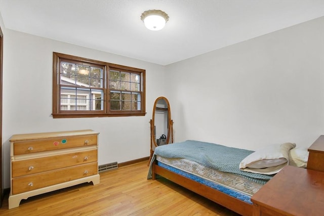 bedroom featuring light hardwood / wood-style flooring