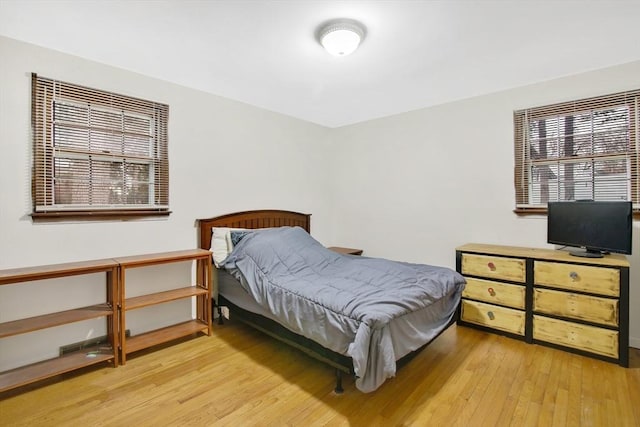 bedroom featuring light wood-type flooring