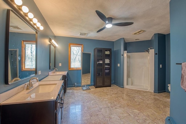 full bath with ceiling fan, visible vents, and a shower