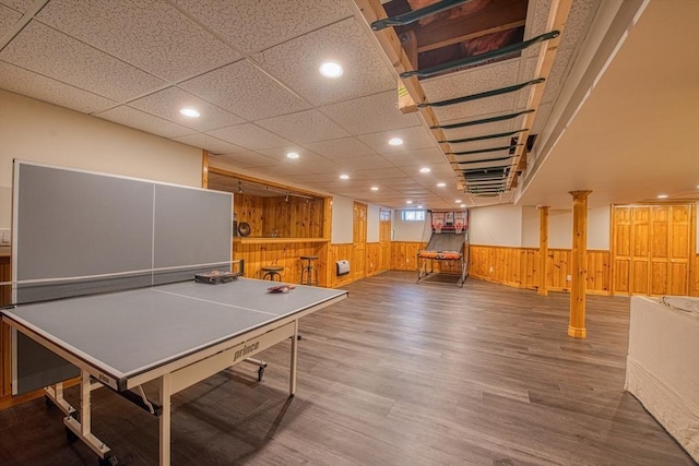 rec room featuring recessed lighting, wainscoting, and wood finished floors