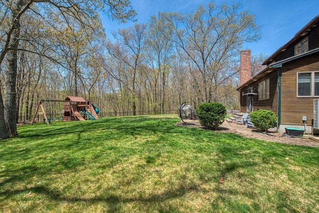 view of yard featuring a playground