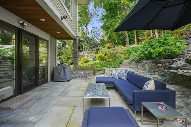 view of patio / terrace with an outdoor hangout area and area for grilling