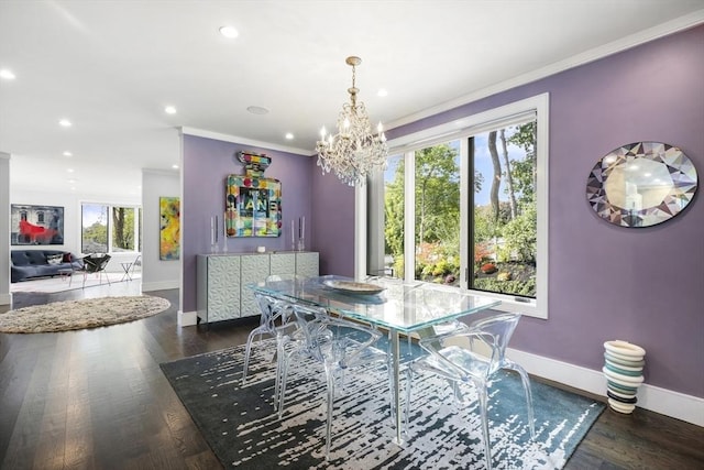 dining area with baseboards, dark wood-style floors, an inviting chandelier, crown molding, and recessed lighting