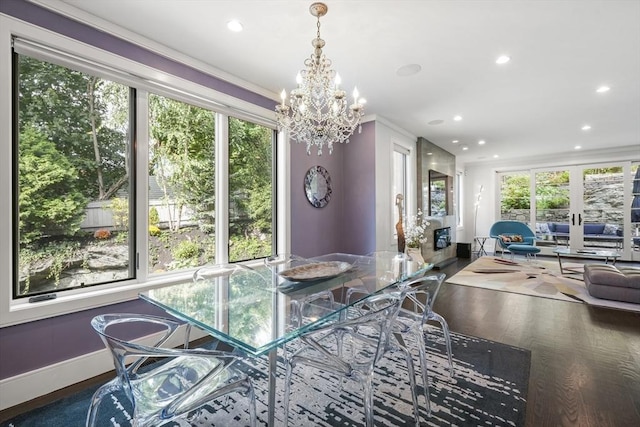 dining room featuring recessed lighting, baseboards, dark wood-type flooring, and french doors