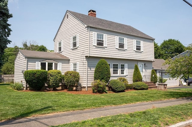2 Proctor Cir, Peabody, MA 01960 - view of front of property with a chimney and a front lawn