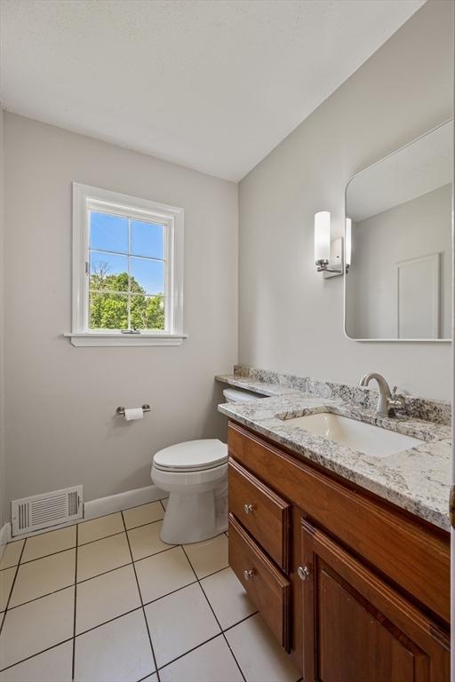 2 Proctor Cir, Peabody, MA 01960 - bathroom with vanity and tile patterned floors