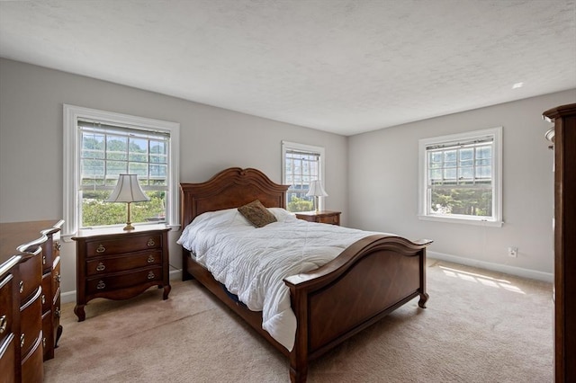 2 Proctor Cir, Peabody, MA 01960 - bedroom with multiple windows and light carpet