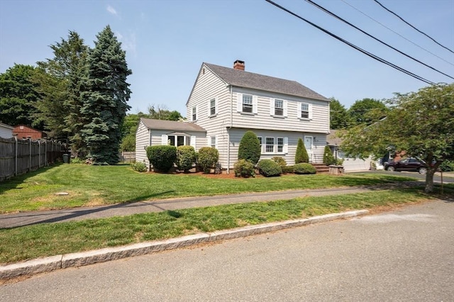 2 Proctor Cir, Peabody, MA 01960 - colonial home featuring a chimney