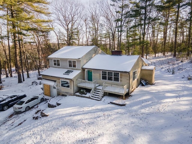 view of front of home with a wooden deck