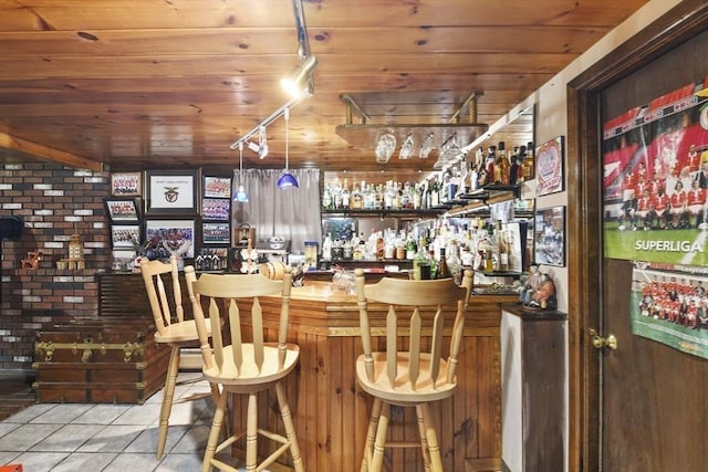 288 Norman St, Fall River, MA 02721 - indoor dry bar with wood ceiling, tile patterned floors, and rail lighting