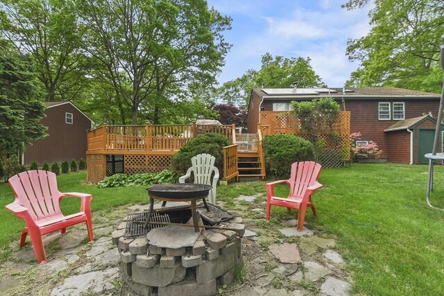 288 Norman St, Fall River, MA 02721 - view of patio with a fire pit, a wooden deck, and stairway