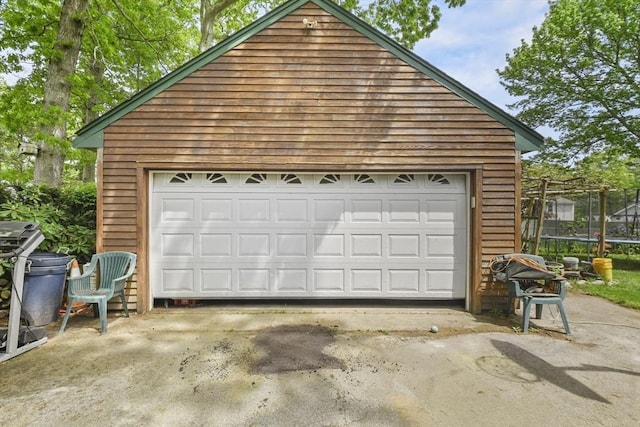 288 Norman St, Fall River, MA 02721 - detached garage featuring a trampoline