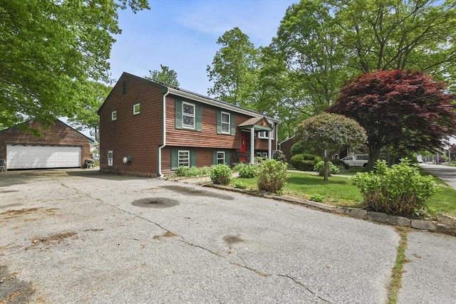 288 Norman St, Fall River, MA 02721 - view of front of property featuring an outbuilding and a detached garage
