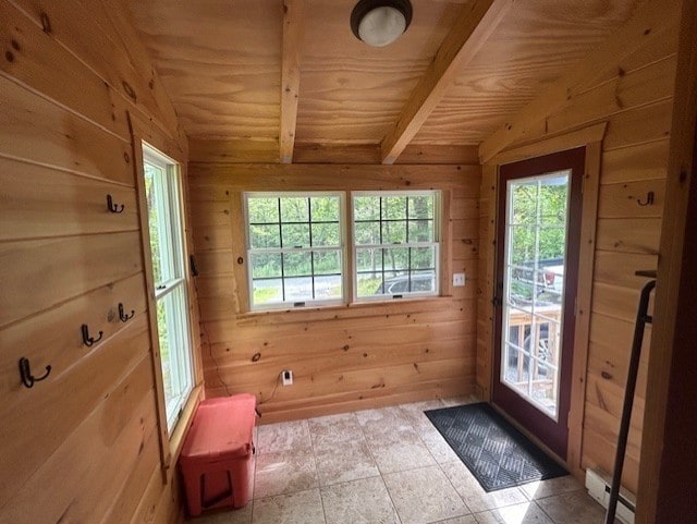 doorway to outside featuring a baseboard heating unit, tile patterned flooring, wood walls, vaulted ceiling with beams, and wooden ceiling