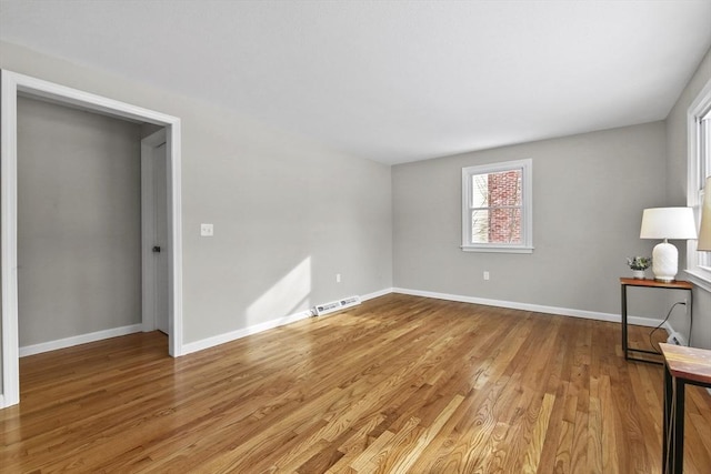 empty room with light wood-type flooring